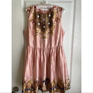 Silky dress with intricate printed details